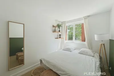 Un ou plusieurs lits dans un hébergement de l'établissement Flexliving - Whole flat - Friant