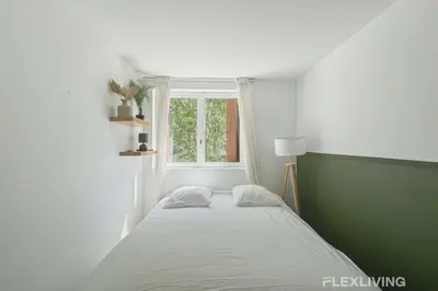 Un ou plusieurs lits dans un hébergement de l'établissement Flexliving - Whole flat - Friant