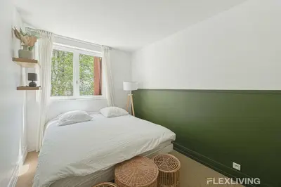 Un ou plusieurs lits dans un hébergement de l'établissement Flexliving - Room - Friant