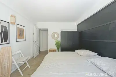 Un ou plusieurs lits dans un hébergement de l'établissement Flexliving - room - Friant