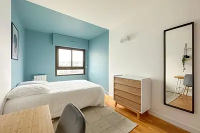 Un ou plusieurs lits dans un hébergement de l'établissement Flexliving - whole apartment - Hillairet