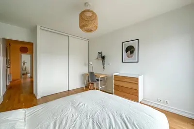 Un ou plusieurs lits dans un hébergement de l'établissement Flexliving - whole apartment - Hillairet