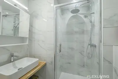 Salle de bains dans l'établissement Flexliving - studio - versailles