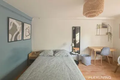Un ou plusieurs lits dans un hébergement de l'établissement Flexliving - Studio - St Antoine