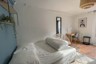 Un ou plusieurs lits dans un hébergement de l'établissement Flexliving - Studio - St Antoine