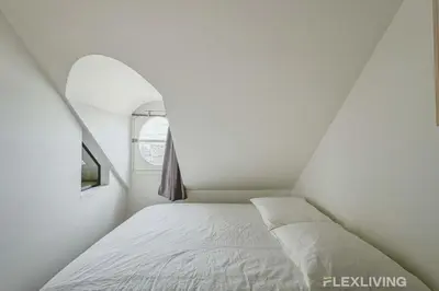 Un ou plusieurs lits dans un hébergement de l'établissement Flexliving - Onebedroom - Malesherbes - Eiffel Tower view