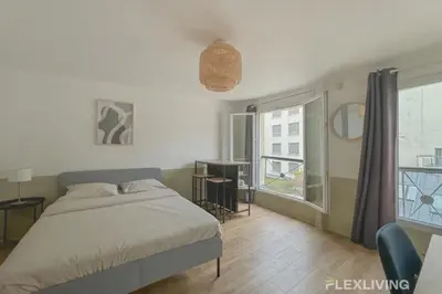 Un ou plusieurs lits dans un hébergement de l'établissement Flexliving - Studio - Echiquier