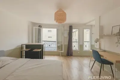 Un ou plusieurs lits dans un hébergement de l'établissement Flexliving - Studio - Echiquier
