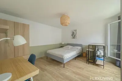 Un ou plusieurs lits dans un hébergement de l'établissement Flexliving - Studio - Echiquier