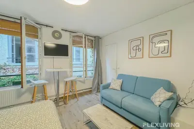 Télévision ou salle de divertissement dans l'établissement Flexliving - Studio - Jarente