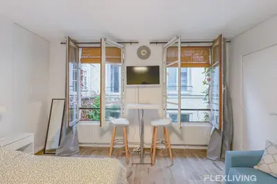 Télévision ou salle de divertissement dans l'établissement Flexliving - Studio - Jarente