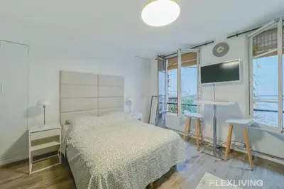 Un ou plusieurs lits dans un hébergement de l'établissement Flexliving - Studio - Jarente