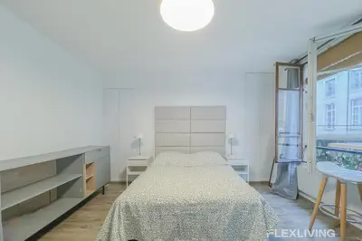 Un ou plusieurs lits dans un hébergement de l'établissement Flexliving - Studio - Jarente