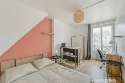 Un ou plusieurs lits dans un hébergement de l'établissement Studio cosy à Neuilly Ligne 1 à 5min & La Défense