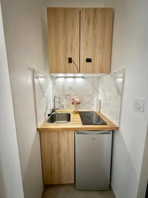 Cuisine ou kitchenette dans l'établissement Flat 800m to Champs de Mars