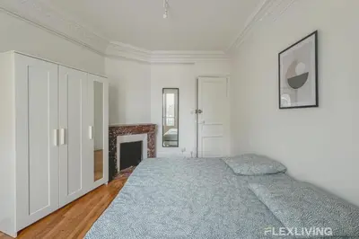 Un ou plusieurs lits dans un hébergement de l'établissement Flexliving - Room - Henri Sellier - Suresnes 92
