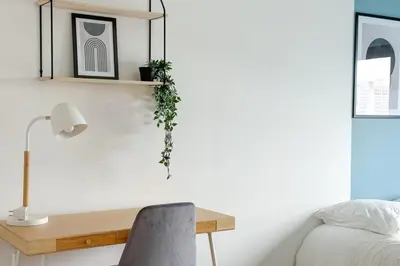 Un ou plusieurs lits dans un hébergement de l'établissement Flexliving - room - Hillairet