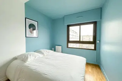 Un ou plusieurs lits dans un hébergement de l'établissement Flexliving - room - Hillairet
