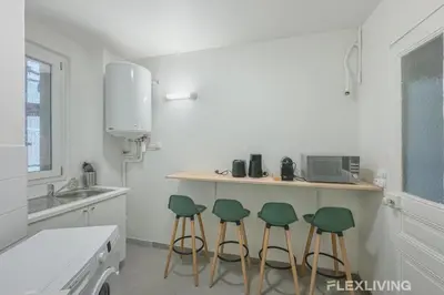 Cuisine ou kitchenette dans l'établissement Flexliving - Room - Henri Sellier - Suresnes 92