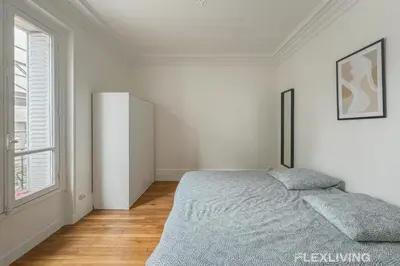 Un ou plusieurs lits dans un hébergement de l'établissement Flexliving - Room - Henri Sellier - Suresnes 92