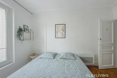 Un ou plusieurs lits dans un hébergement de l'établissement Flexliving - Room - Henri Sellier - Suresnes 92