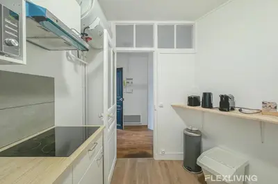 Cuisine ou kitchenette dans l'établissement Flexliving - Room - Henri Sellier - Suresnes 92