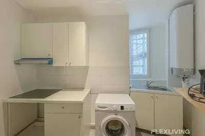 Cuisine ou kitchenette dans l'établissement Flexliving - Room - Henri Sellier - Suresnes 92