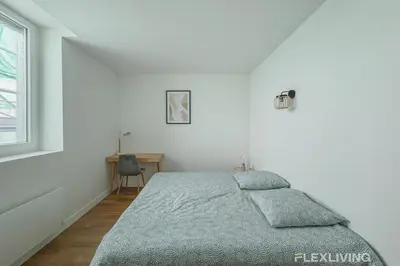 Un ou plusieurs lits dans un hébergement de l'établissement Flexliving - Room - Henri Sellier - Suresnes 92