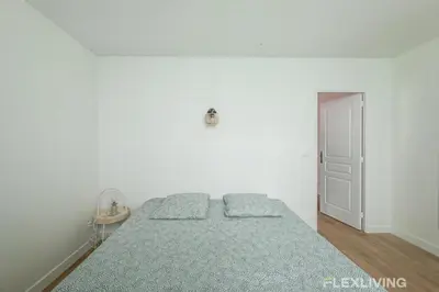 Un ou plusieurs lits dans un hébergement de l'établissement Flexliving - Room - Henri Sellier - Suresnes 92