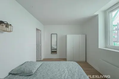 Un ou plusieurs lits dans un hébergement de l'établissement Flexliving - Room - Henri Sellier - Suresnes 92