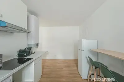 Cuisine ou kitchenette dans l'établissement Flexliving - Room - Henri Sellier - Suresnes 92