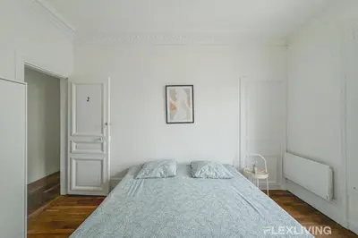 Un ou plusieurs lits dans un hébergement de l'établissement Flexliving - Room - Henri Sellier - Suresnes 92