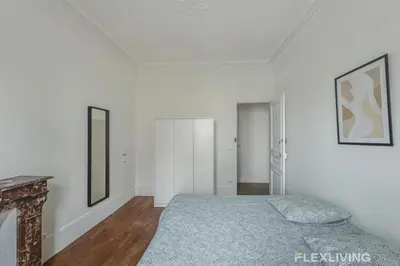 Un ou plusieurs lits dans un hébergement de l'établissement Flexliving - Room - Henri Sellier - Suresnes 92