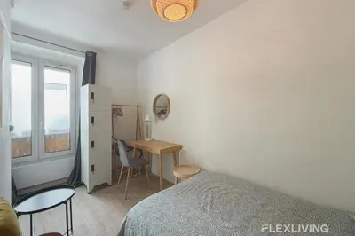 Un ou plusieurs lits dans un hébergement de l'établissement Flexliving - Lovely studio near Jardin des Plantes