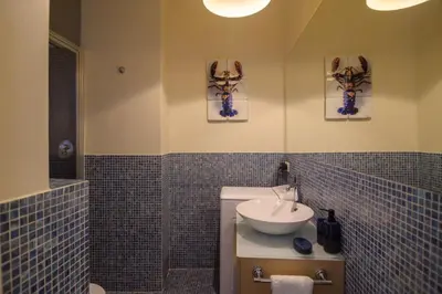 Salle de bains dans l'établissement Le Marais Moderne