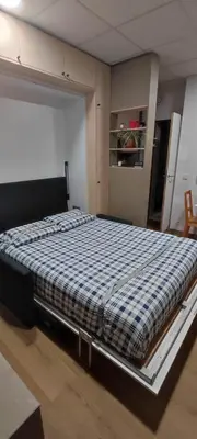 Un ou plusieurs lits dans un hébergement de l'établissement Studio Porte de Vanves - Paris Sud