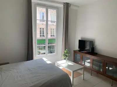 Un ou plusieurs lits dans un hébergement de l'établissement Charming studio Paris City Center - Maubert Mutualité