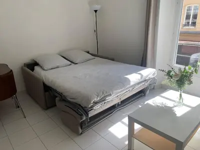 Un ou plusieurs lits dans un hébergement de l'établissement Charming studio Paris City Center - Maubert Mutualité