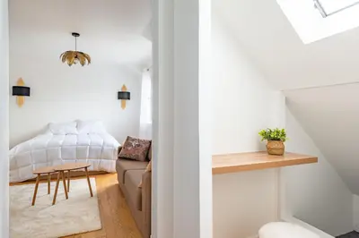 Un ou plusieurs lits dans un hébergement de l'établissement Appartement 75017 proche Champs Elysées