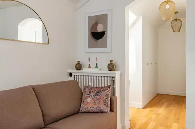 Coin salon dans l'établissement Appartement 75017 proche Champs Elysées