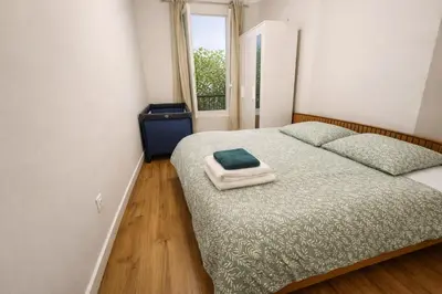 Un ou plusieurs lits dans un hébergement de l'établissement Sublime appartement a Montmartre