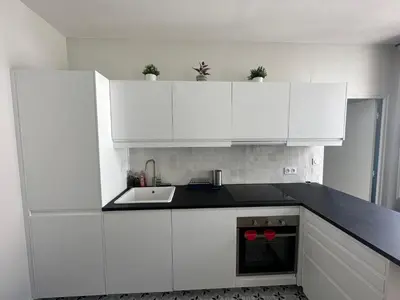 Cuisine ou kitchenette dans l'établissement Saint-Honore - Luxury apartment 1 BR