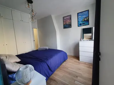 Un ou plusieurs lits dans un hébergement de l'établissement Saint-Honore - Luxury apartment 1 BR