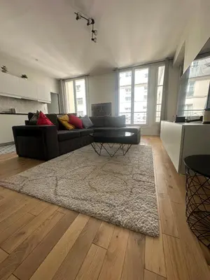 Coin salon dans l'établissement Saint-Honore - Luxury apartment 1 BR