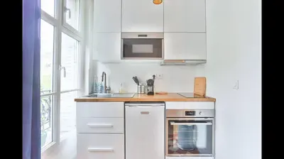 Cuisine ou kitchenette dans l'établissement Superbe appartement familial au cœur du 14 eme