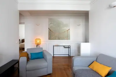 Coin salon dans l'établissement Superbe appartement familial au cœur du 14 eme