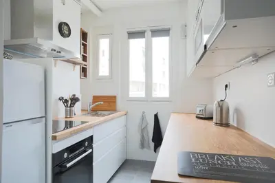 Cuisine ou kitchenette dans l'établissement Superbe appartement familial au cœur du 14 eme