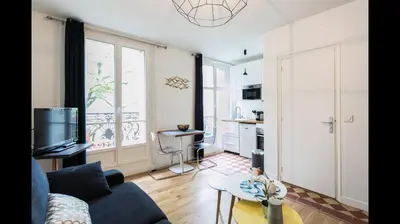 Coin salon dans l'établissement Superbe appartement familial au cœur du 14 eme