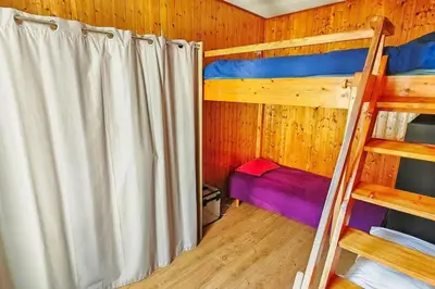 Un ou plusieurs lits dans un hébergement de l'établissement Charmant Appartement près de Montmartre