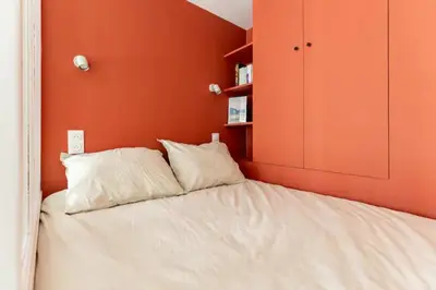 Un ou plusieurs lits dans un hébergement de l'établissement Appartement cosy avec terrasse proche de Paris